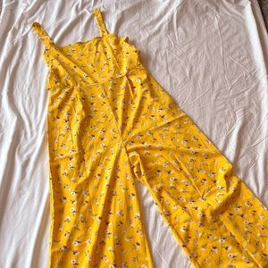 Yellow jumper with floral pattern